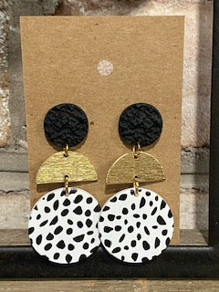 Black and gold with spots